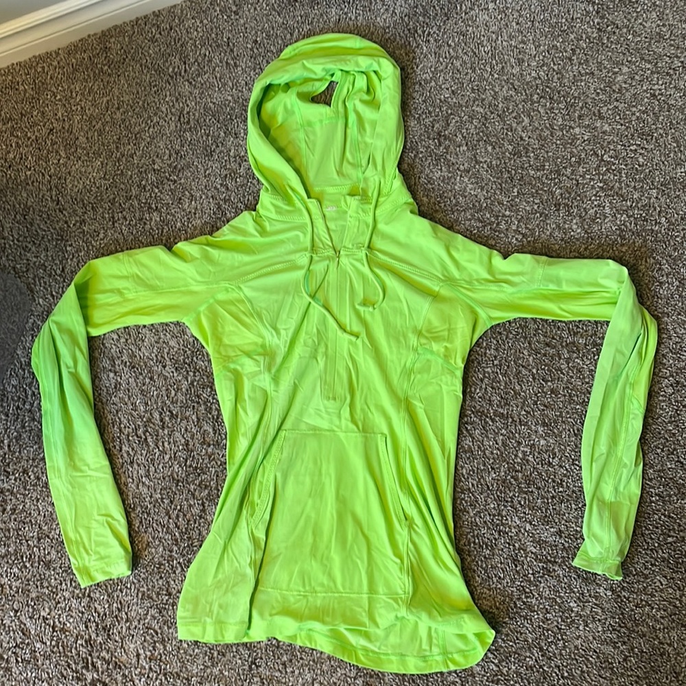 Lululemon light running hoodie, fitted with pony tail hole.